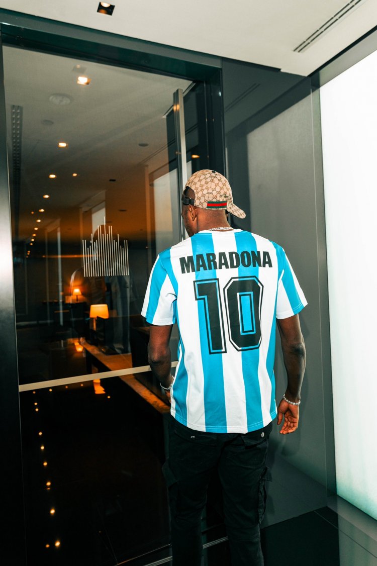 PHOTOS: Fans react as Osimhen flaunts new Maradona jersey